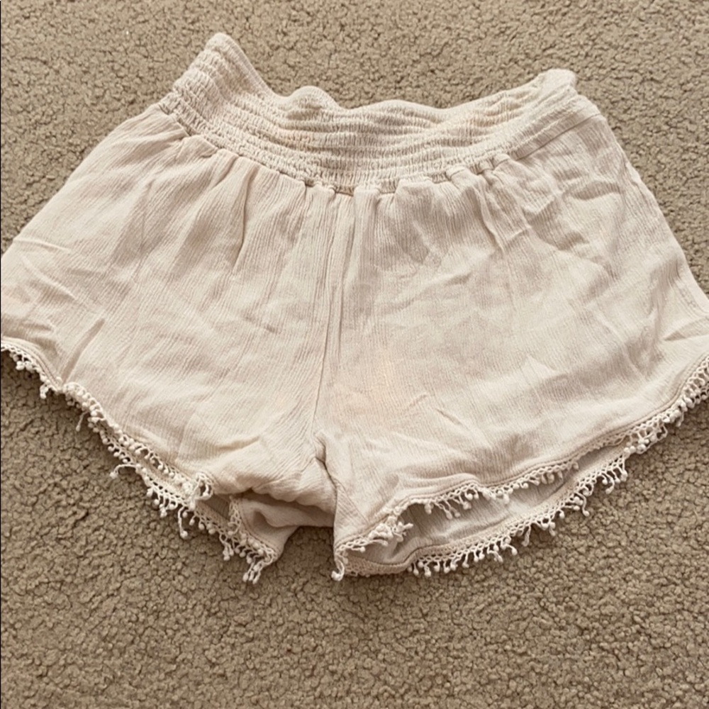 Tan fringe shorts